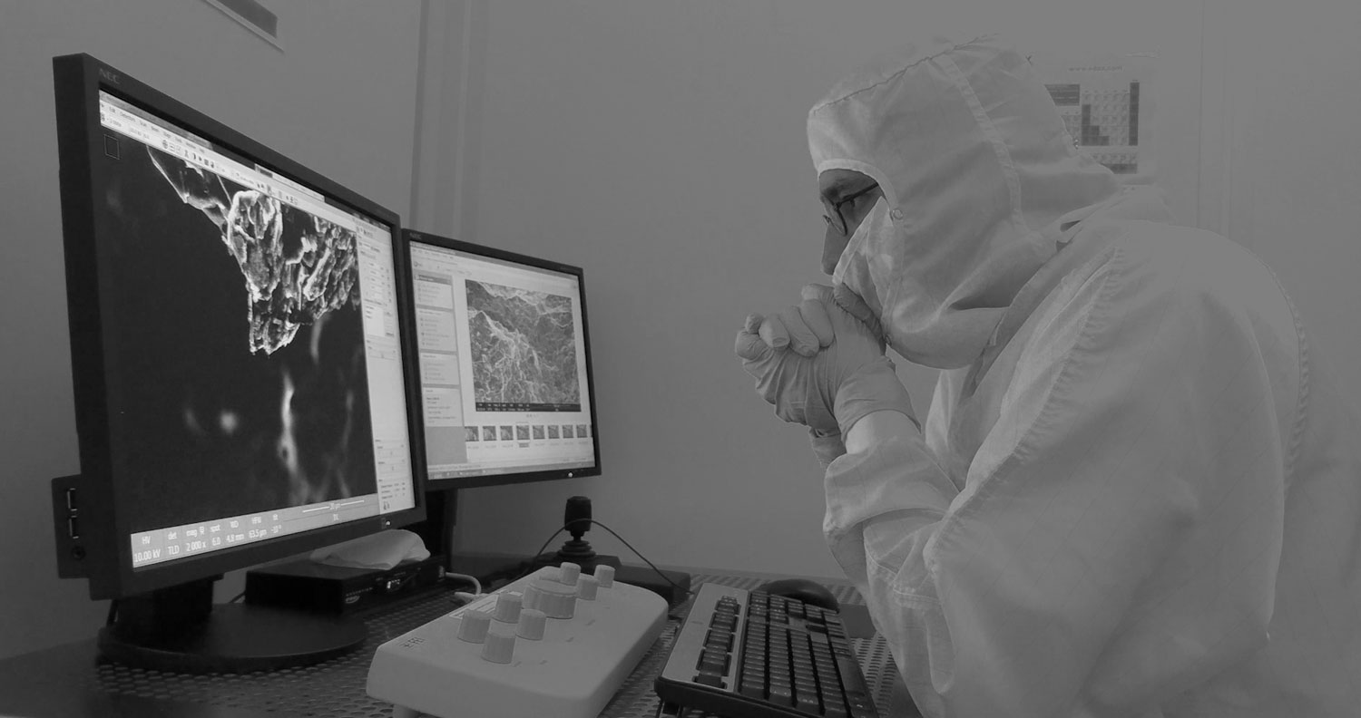 João Martinho Moura working at INL clean room, 2019. INL, Scale Travels